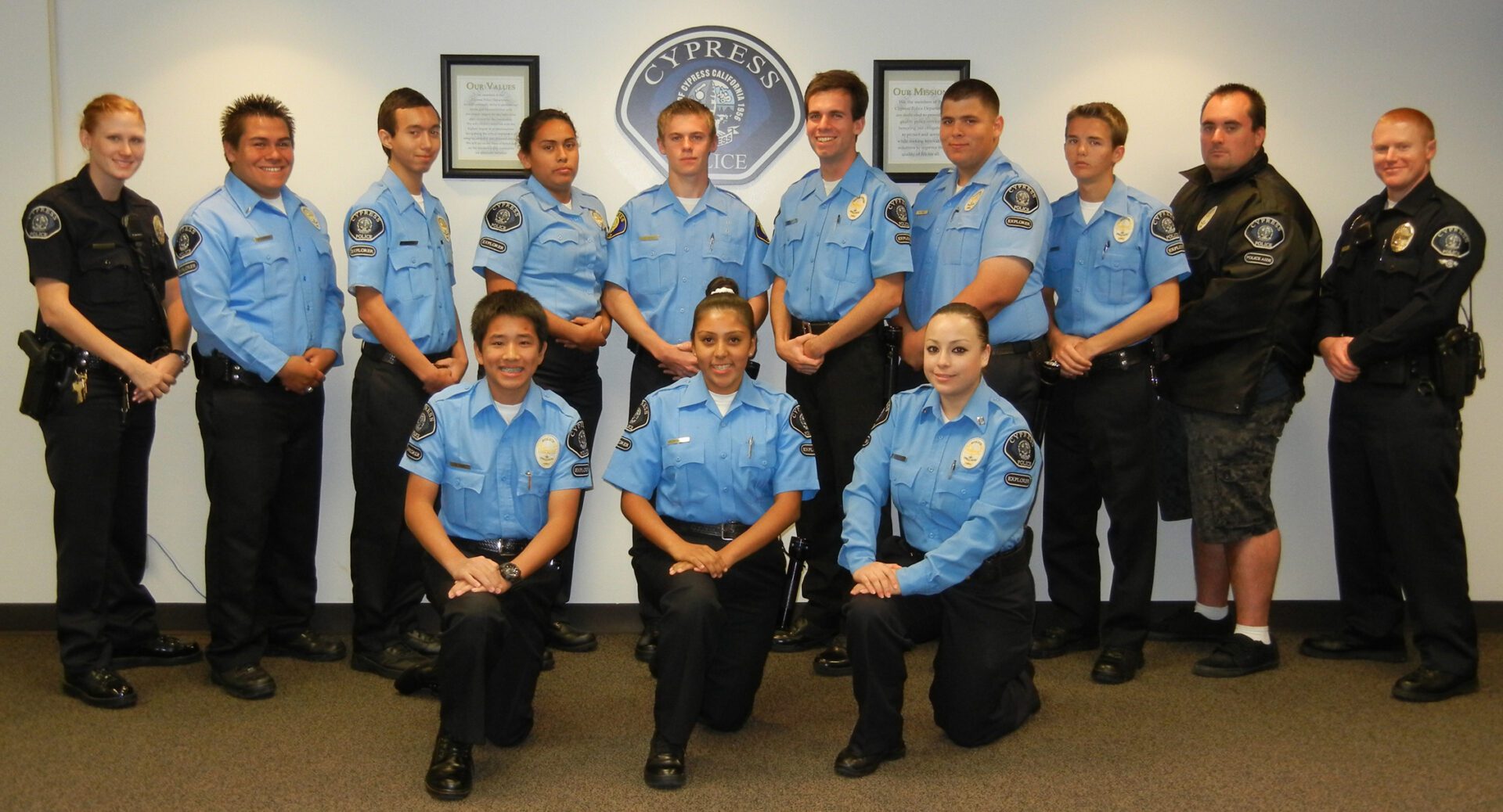 A group of police officers posing for a picture.