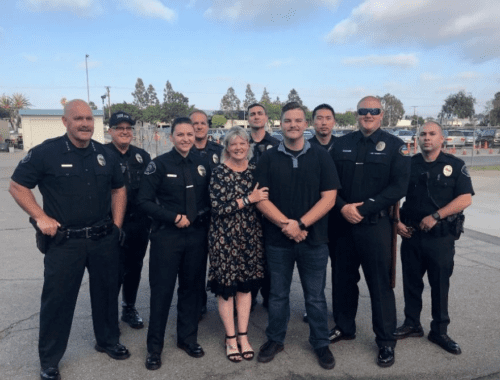 A group of police officers standing next to each other.